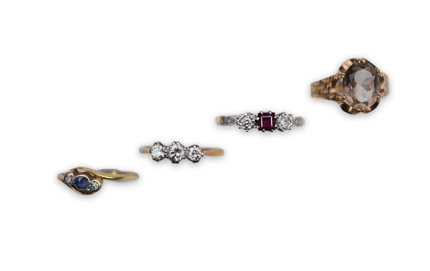 Four gem-set rings